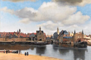 Johannes Vermeer - Ansicht von Delft: Realistische Stadtlandschaft mit Hafen, Schiffen und markantem Wolkenhimmel im niederländischen Barock